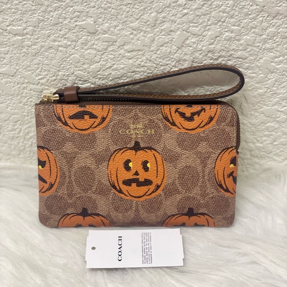 Coach Handbags - NWT Coach Corner Zip Wristlet In Signature Canvas With Halloween Print CCL20
